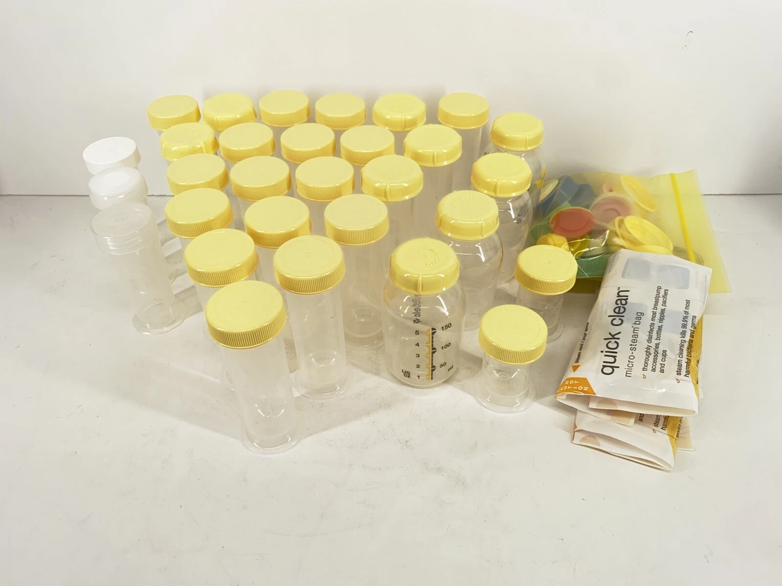 Lot of Medela Bottles (21) 2.5oz/80ml (4) 5oz/150ml (2) 1oz Breast Milk Storage