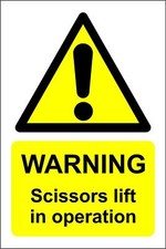 Warning scissors lift in operation Safety sign