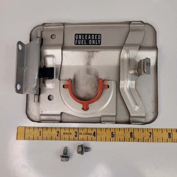 Nissan Pathfinder 1990-1995 puerta de combustible cubierta de gasolina plateada con tornillos OEM Foto 3 de 3