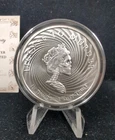 2017 Silver Shield 1 oz .999 Silver Democide - License to Murder Art Round 6480