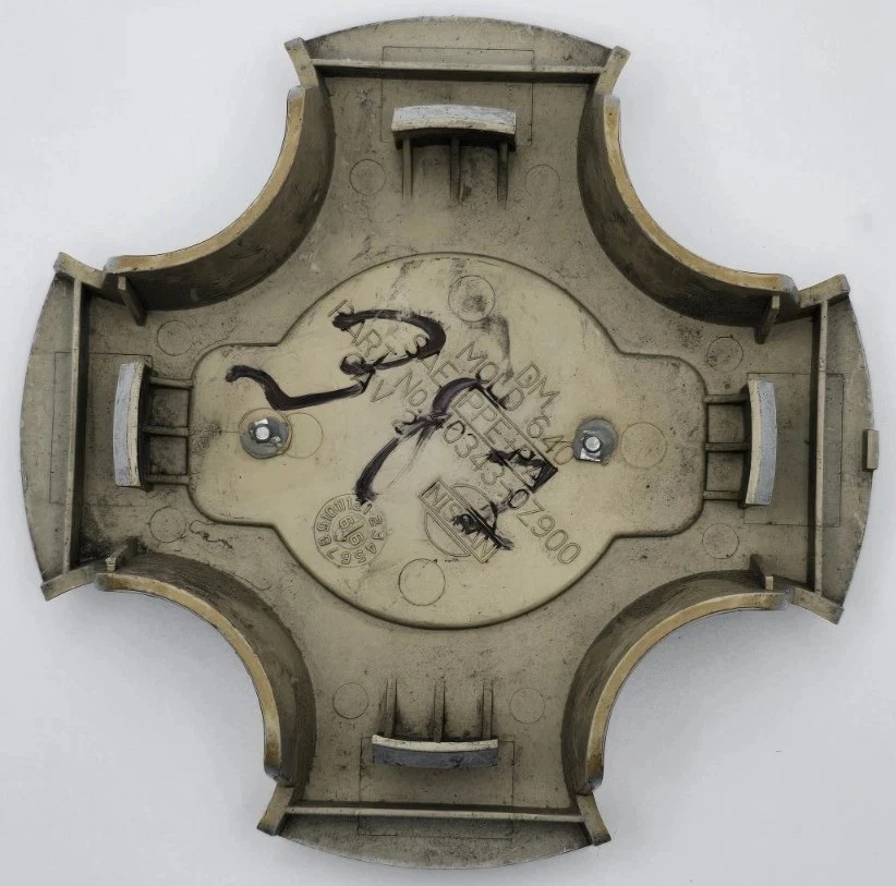 Tapacubos Nissan Altima 1995-2001 tapa central OEM #40343-0Z900 Foto 3 de 3