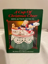 A Cup Of Christmas Cheer Enesco Musical Box Plays We Wish You A Merry Christmas