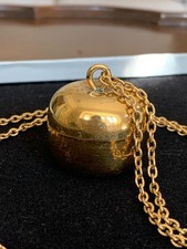 Vintage Revlon Moon Drops solid perfume golden apple pendant necklace