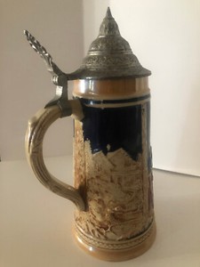 collectable vintage western German lidded 9 and #3/4 inches tall beer stein 