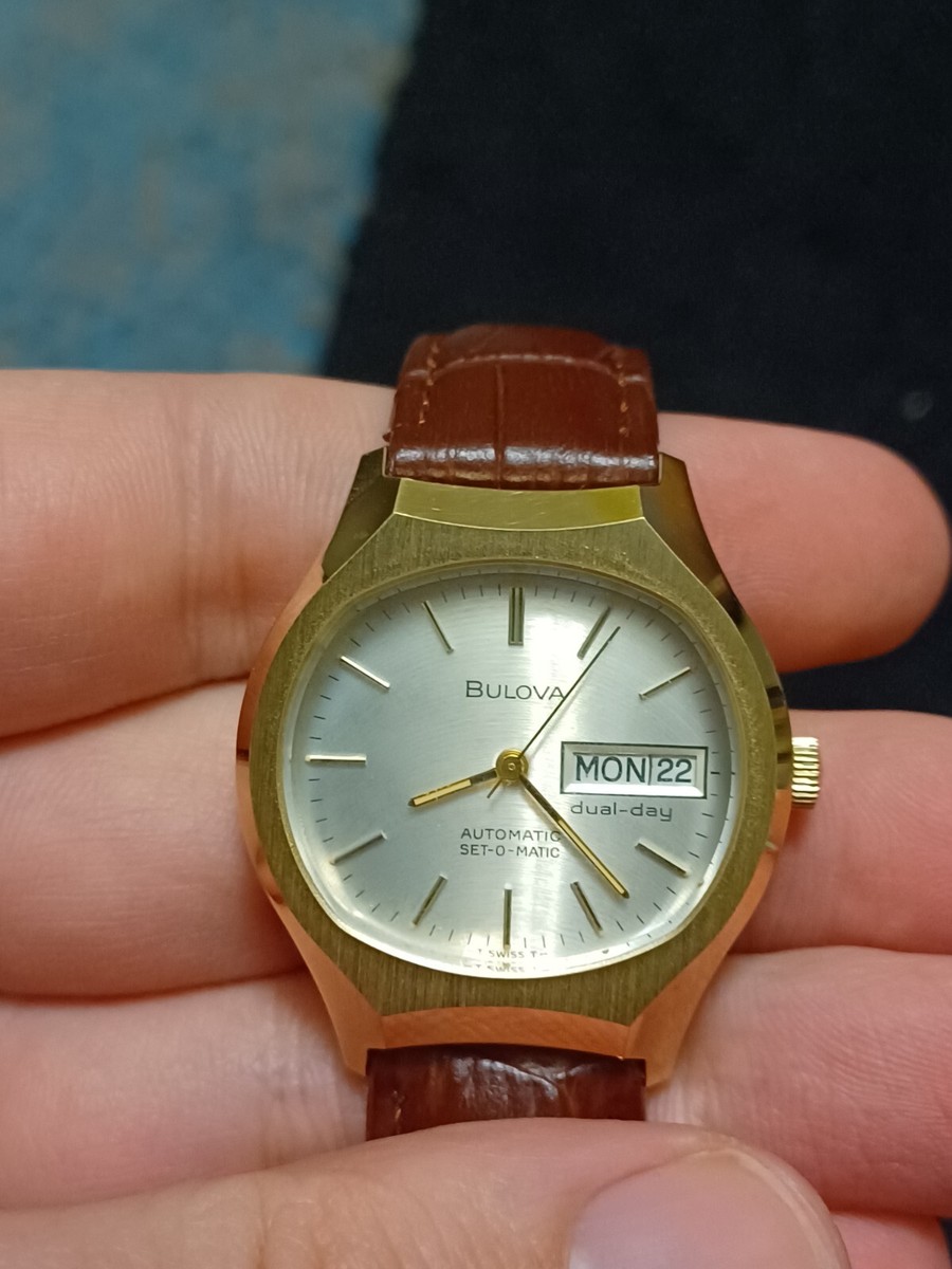 Vintage N7 1977 Bulova Oval Gold Tone Set-O-Matic Automatic