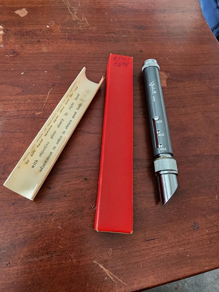 A pocket-sized vintage Japanese microscope that actually zooms 20-60x — comes in its original box and looks like a prop from a 1970s spy film.