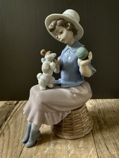 Nao by Lladro Girl with Puppy and Ball Seated Porcelain Figurine
