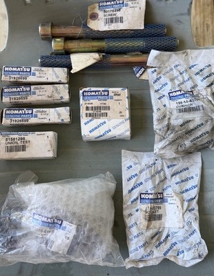 TOTAL OF 14 GENUINE KOMATSU PARTS ALL LISTED IN DESCRIPTION