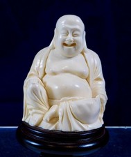 Vintage Chinese Young Happy Laughing Buddha Ivory Resin sitting on Wood Plinth
