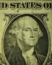 RARE ONE DOLLAR BILL WITH BLACK INK SPLASHED ALL OVER THE FRONT AND BACK.