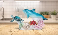 8.75"W Sea Turtle, Dolphin, & Clownfish Swimming Around Coral Together Figurine