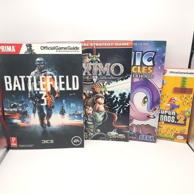 Prima Games Lot of 4 Guides Battlefield Miximo Sonic Chronicles Super Mario Bros
