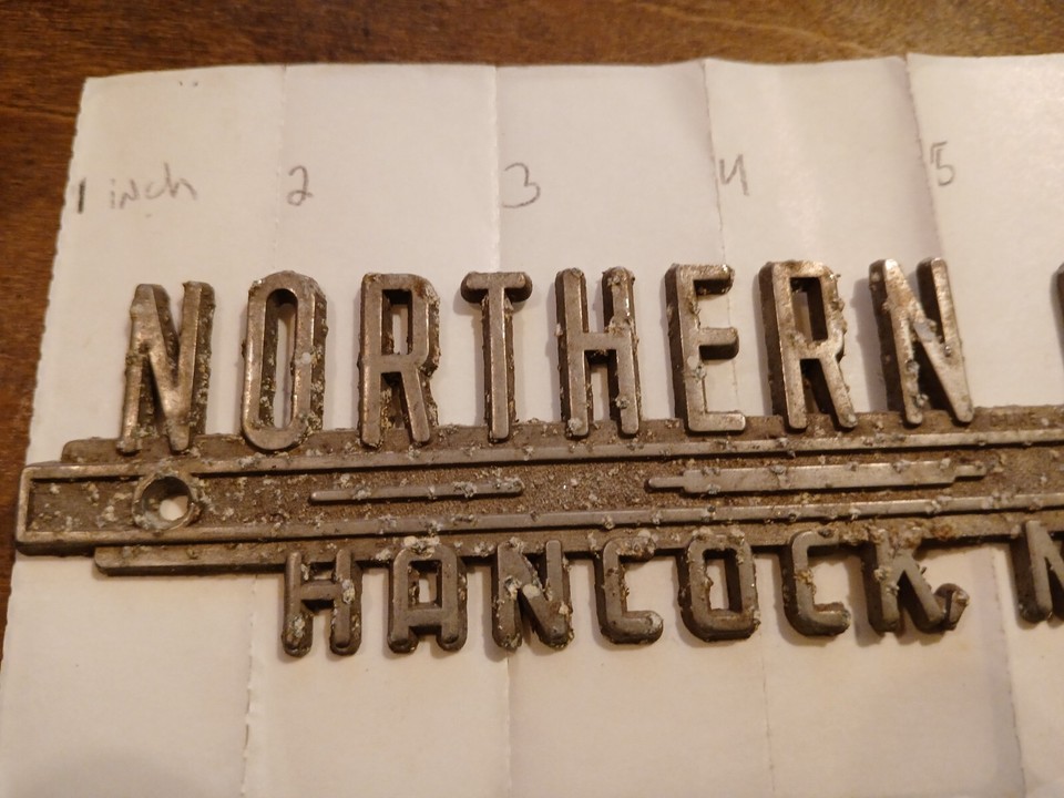 Vintage Metal Northern Auto Hancock Michigan. Automobile dealer emblem