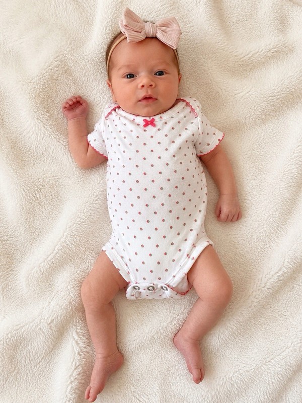 Baby bodysuit Brand: Carter’s Size: Newborn