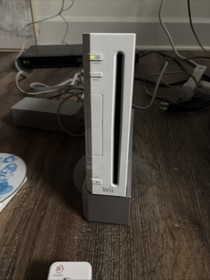 Wii Console With Mariokart And Mario Bros Wii