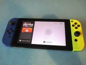 Nintendo Switch System 32GB Console w/Neon Yellow & Blue Joy-Cons +Case & Extras