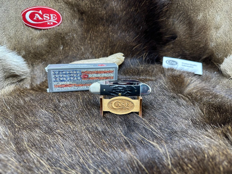 Cuchillo de canoa Case 2012 con asas de hueso ranurado negro como nuevo en caja Foto 2 de 4