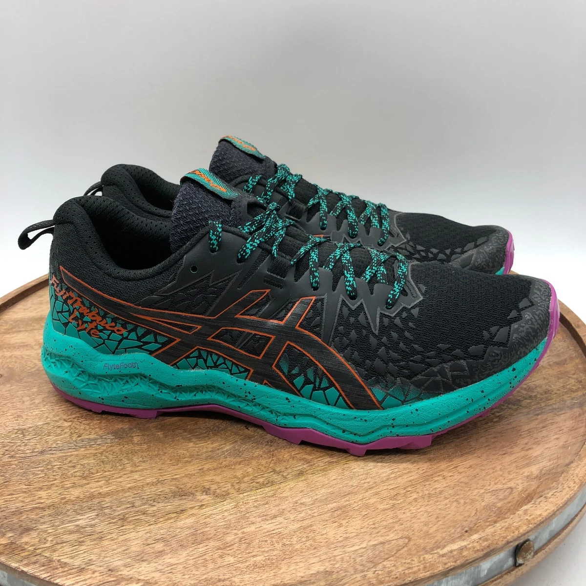 Asics Women s FujiTrabuco Lyte Trail Shoes Size 9.5 Black Blue
