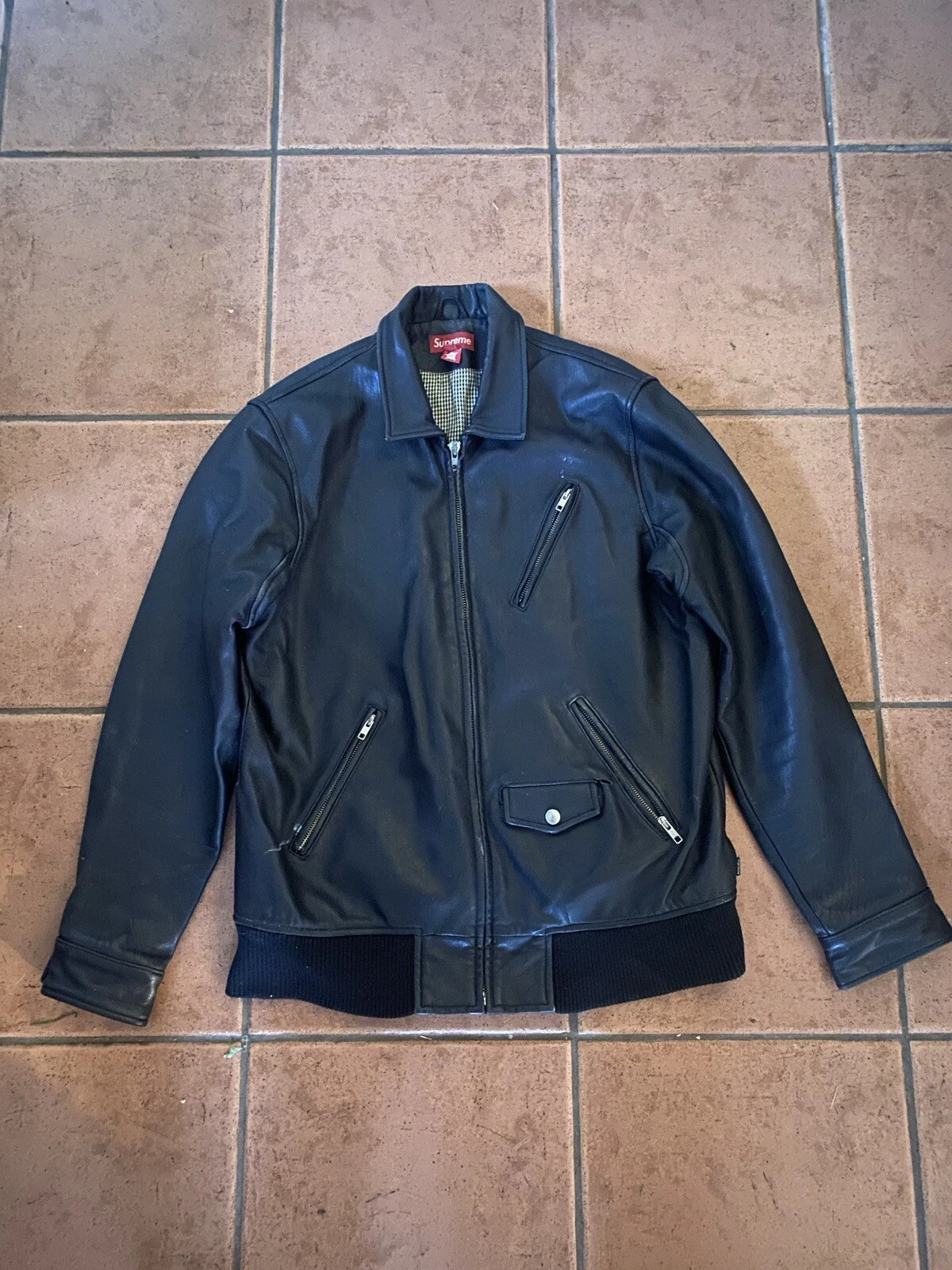 Giacca vintage Supreme in pelle con fodera per denti di cane Taglia Large