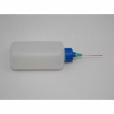 Dispenser per OLII e fluidi con siringa dosatrice corpo in plastica tappo a vite