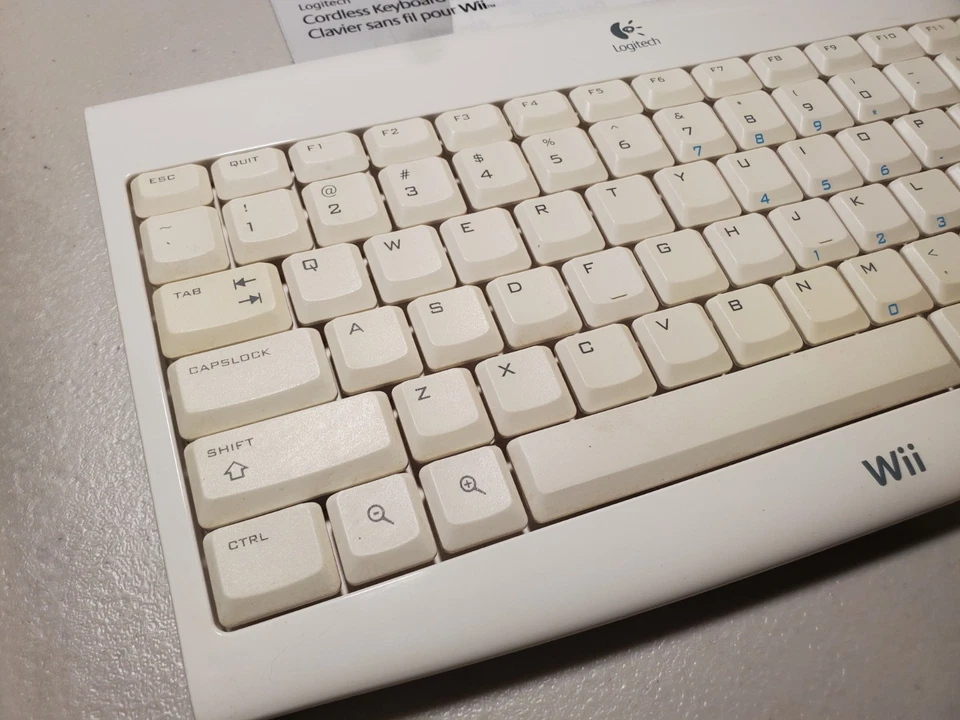 Беспроводная беспроводная клавиатура Nintendo Wii Logitech с ключом бесплатная быстрая доставка! - Изображение 2 из 4