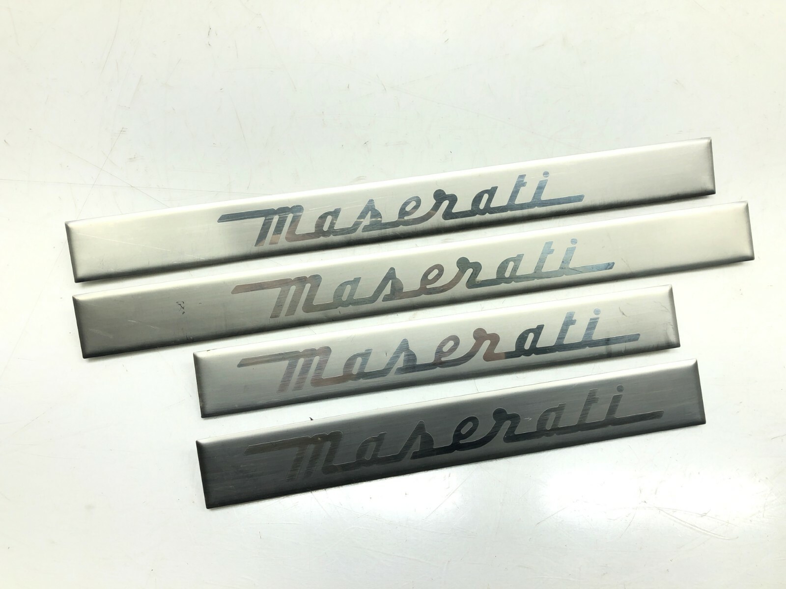 2014-2020 MASERATI QUATTROPORTE ENTRY SILL SCUFF TRIM SET X4 OEM.