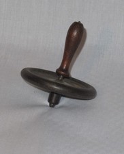 Top. Antique. Cast Iron with Wooden Handle