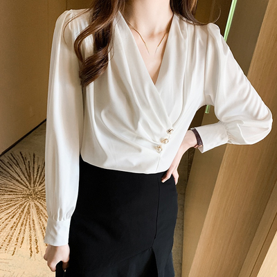 white silk blouse with a frill