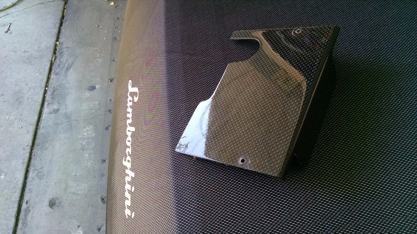 LAMBORGHINI MURCIELAGO / LP640 BATTERY TERMINAL COVER CARBON FIBER OEM