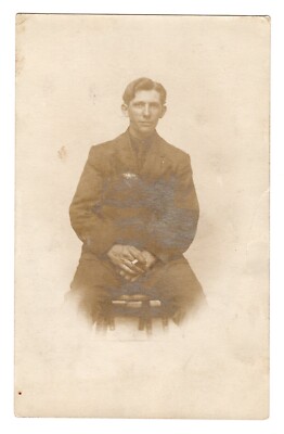 RPPC Handsome Man Smoking Cigarette On Stool Undivided Back Real Photo  Postcard