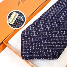 Unused with tag  HERMES jacquard weave H pattern navy purple tie