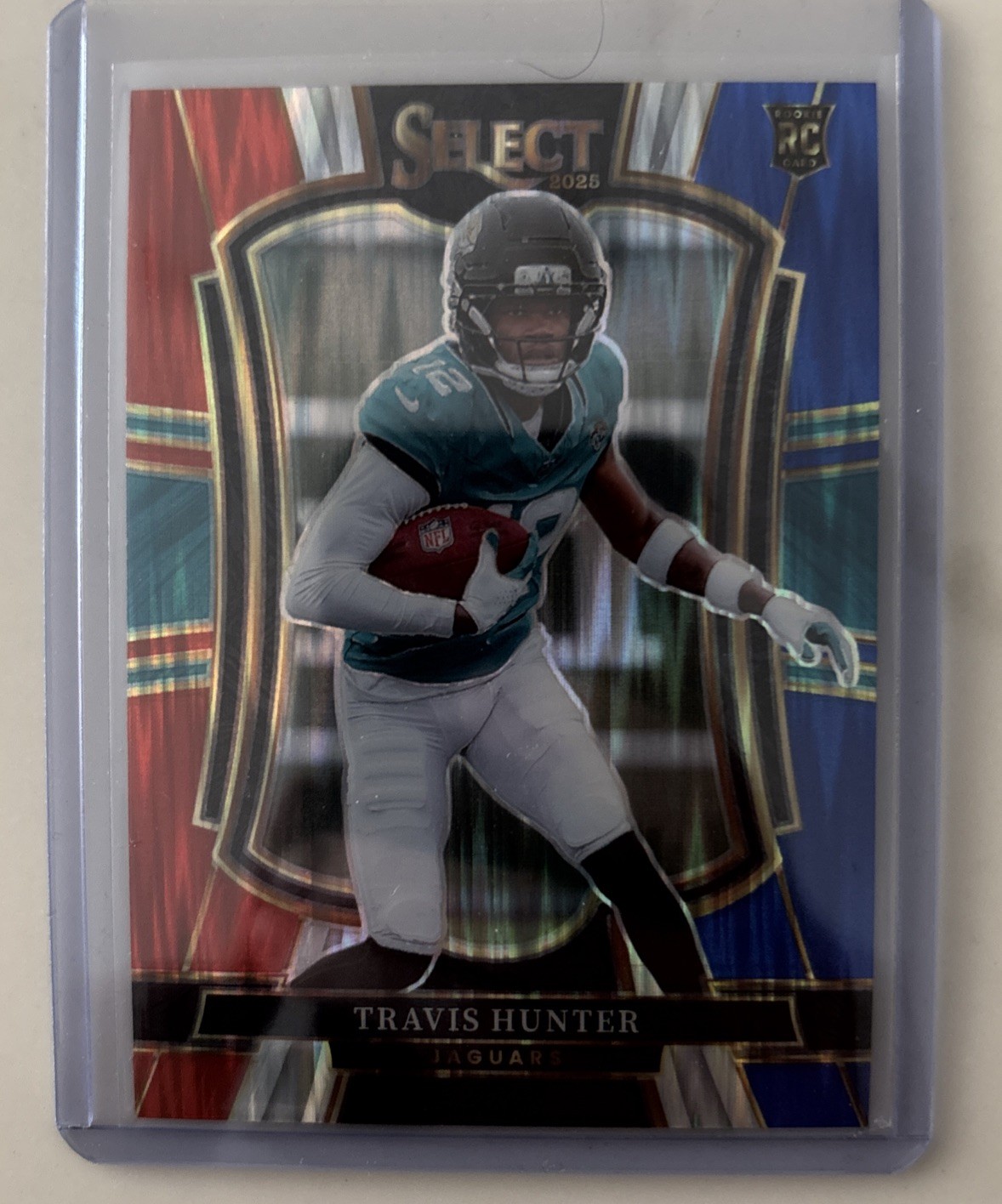 2025 Panini Select Travis Hunter RC Premier Level Red And Blue Shock Prizm 