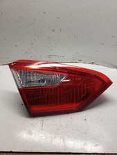 Used Left Inner Tail Light Assembly Fits 2013 Ford Focus Sdn Inner Lid Mounted