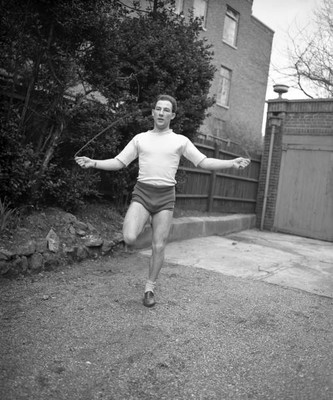 British racing car driver Stirling Moss skipping Hampstead fla- 1951 Old Photo