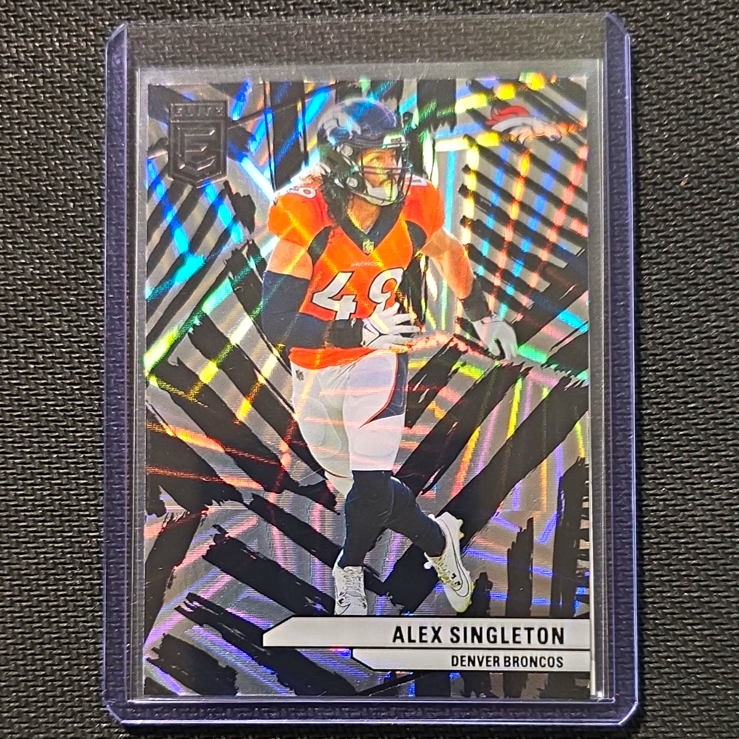 Panini 2024 Donruss Elite Alex Singleton Broncos #79 Razzle Dazzle Hologram