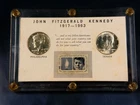 1964 P & D Kennedy Silver Half Dollar and 1963 Stamp Set In Vintage Capital Case