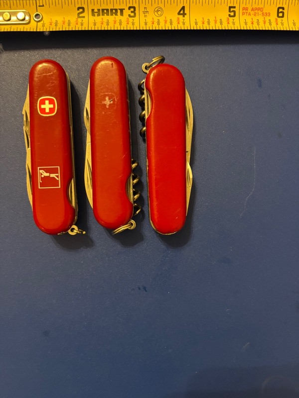 Lot of (2) Wenger EVO 10 multi tools, (1) Vintage Wenger Golf Pro, 85mm, red