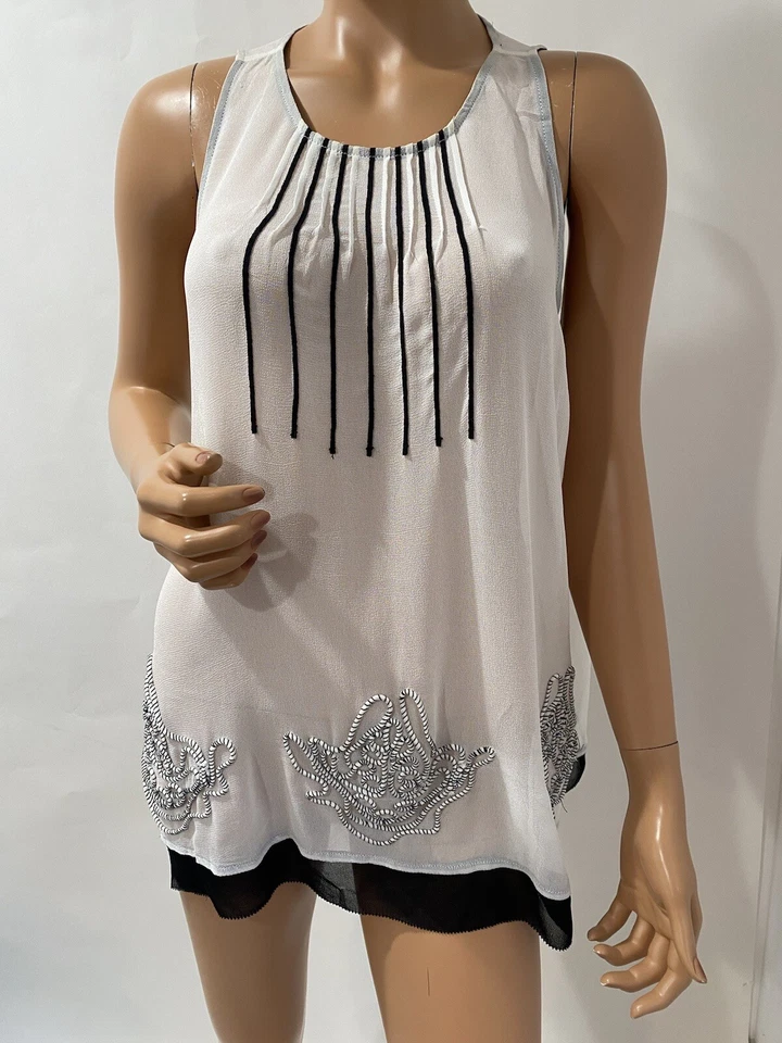 Top esley sin mangas talla grande blanco gasa bordado  Foto 2 de 4