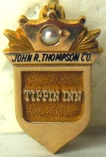 employee service award tie pin advertising John R. Thompson Co. TIFFIN INN