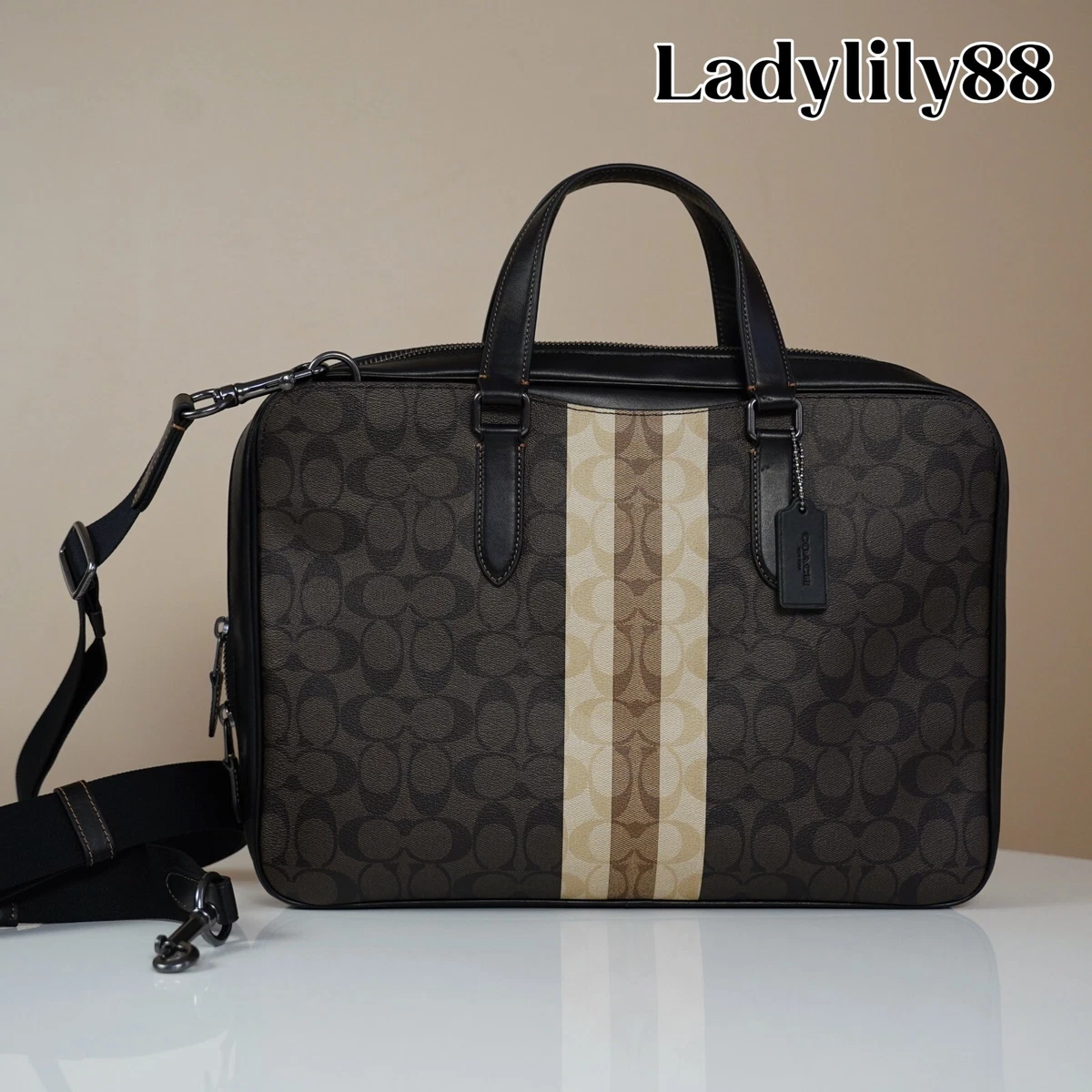 laptop sleeve in signature canvas with coach varsity