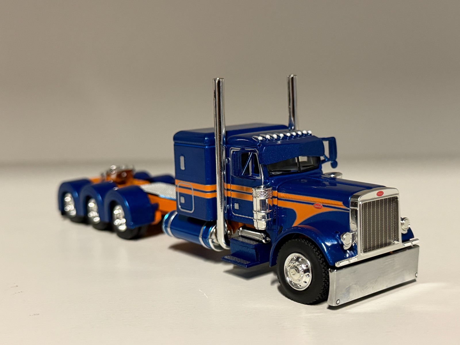 DCP 1/64 Blue & Orange Flattop 48" Peterbilt 379 w/320" Frame (6.25" long)
