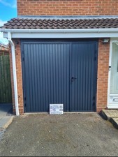 Supplied and fitted Anthracite Vertical side hinged & hung 2/3 x 1/3