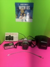 MINOLTA SRT101 35mm SLR Film Camera / MC Rokkor-PF 1:1.4 W/Manual More Untested