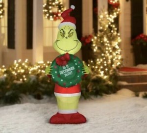 grinch wearing sweater