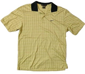 tiger woods yellow shirt