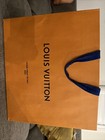 Authentic Louis Vuitton empty shopping bag  15.75” X 13.25” X 6.25 inches.