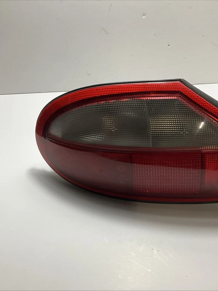 Conjunto de luz trasera exterior lado conductor izquierdo Jaguar XK8 XKR 1997-2000 FABRICANTE DE EQUIPOS ORIGINALES CON BOMBILLA Foto 4 de 4