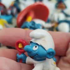Vintage Schleich Baby Smurf Figurine The Smurfs Plastic White Outfit Red Rattle