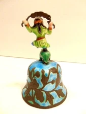 enameled bell with frog and dancing figure in ethnic dress on handle