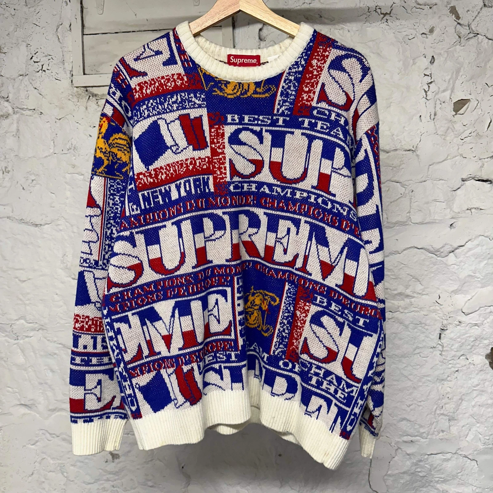 Pull blanc rouge Supreme Best Team Champions taille L